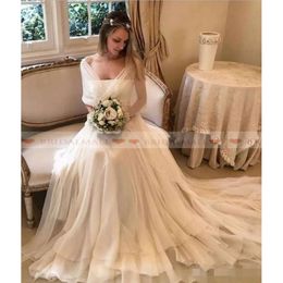 Avec des robes élégantes, une ligne enveloppe en mousseline de soie Ruffles Ruffles Bched Pleas Simple Made Made Plus Taille Garden Country Robe de mariée