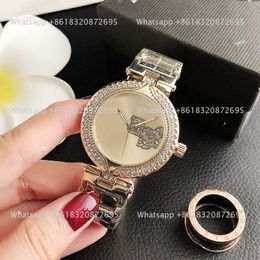 Met luxe logo -merk Kijk vrouwen meid diamant grote letters stijl metal stalen band quartz pols horloges gs 26