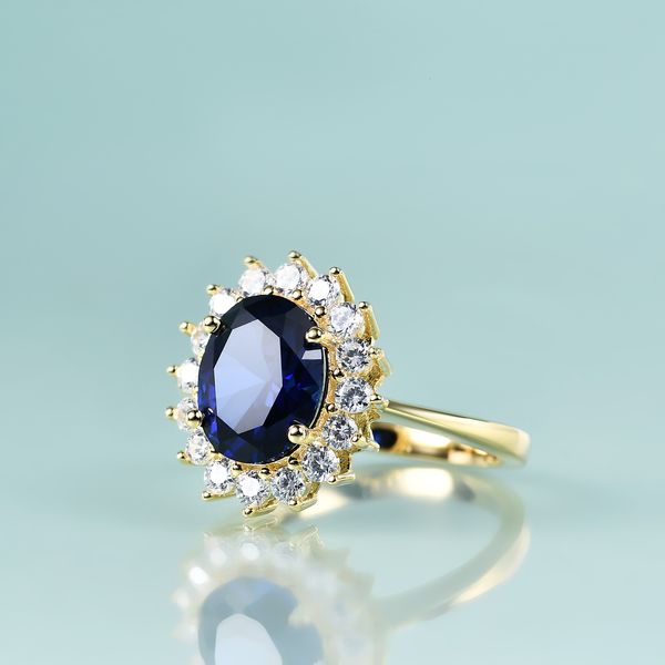 Avec pierres latérales Gem's Beauty Princess Diana Inspiré Déclaration Bague de fiançailles 14K Gold Filled Sterling Silver Laboratory Blue Sapphire Birthstone Ring 230512