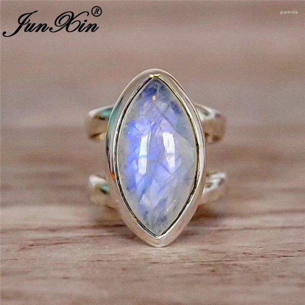 Avec des pierres latérales Junxin Femelle Male Moonstone Ring 925 argent rempli de marquise marquise Coute Ronde d'opale blanche pour femmes Hommes empilant joint