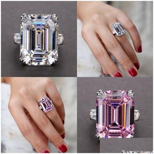 Avec des pierres latérales Bijoux uniques Réel 925 Sterling Sier Taille Émeraude Grand Saphir Rose Cz Diamant Promesse Fête Princesse Femmes Weddin Dhx4M