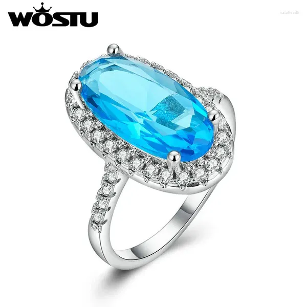 Con pietre laterali WOSTU Lusso Pietra blu Cuore del lago Grandi anelli per le donne Zircone Anello di fidanzamento per matrimonio Moda Regalo gioielli per feste ZBFR203