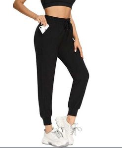 Met joggers voor joggers voor damesachtige zakken lounge broek voor yoga-training.