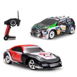 WLTOYS K969 K989 1 28 RC CAR 4WD 24G Remote Control Alloy RC Drift Racing Hoge snelheid 30 kmh offroad rally voertuig speelgoed 240327