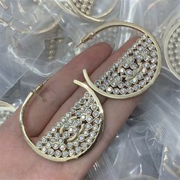 Femme C oreille de luxe Charme Stud Hoop Earting Lettre cclies Brand Designer Femmes Gold Orets Chanells Pearl Diamond Jewelry 78