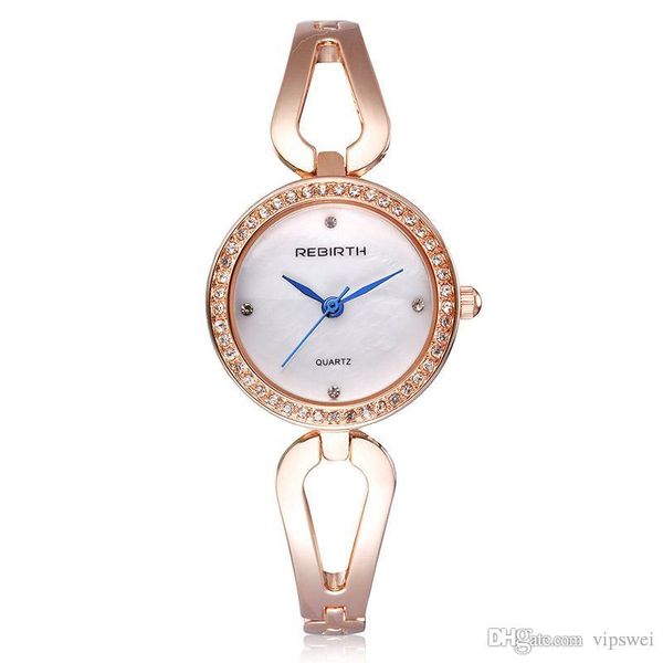 Relojes de vestir de moda para mujer Pulsera hueca diseño de correa manecilla de hora azul Reloj de cuarzo estilo retro Buen regalo reloj de pulsera con esfera de concha Rhinestone