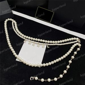 Femme de haute qualité de chaîne de haute qualité accessoires de robe de créateurs dames noues perle de taille luxurys concepteurs chaînes de courroie de courroie pendants ceintur 214t