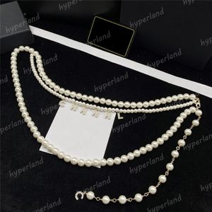 Femme de haute qualité de chaîne de haute qualité accessoires de robe de créateurs dames noues perle de taille luxurys concepteurs chaînes de courroie lettre pendants ceintur 2548