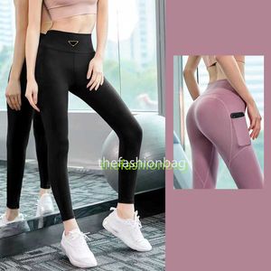 Leggings de yoga pour femmes, pantalons Slim, taille haute, vêtements d'extérieur de styliste, bas serrés avec poche