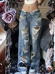 Femme Jeans déchirés en denim Baby Basse taille droite droite lavage dysing zipper Ripped Hole Casual Design High Street 240322