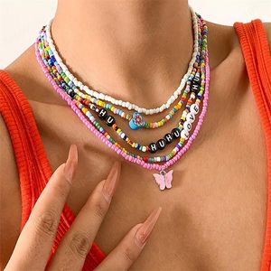 Femmes Acrylique Papillon Lettre Perlé Colliers Multi Couche Couleur Mixte Clavicule Chaîne Européenne Vacances Beach Party Amour Collier Bijoux Accessoires