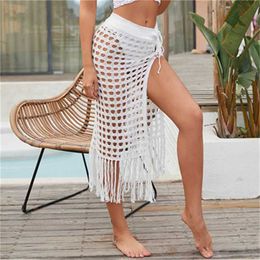 Dames strandkleding 2021 dames mode sexy sh hol out breide strand maxi gebreide rok split kwikers strandkleding zomer haakhaak deksel op rokken y240504