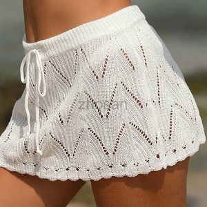 Femmes à plage Wear Wear Women Crochet Beach Bikini Cover Up Summer TrawString High Taist Trithed Mini jupes Beachwear Pareo Bathing Fissure D240507