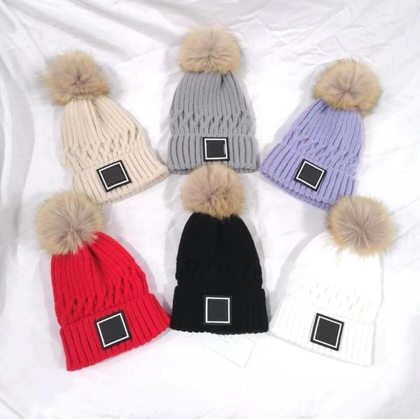Bonnet de luxe pour femmes, chapeaux d'hiver chauds en tricot, bonnets amples pour femmes, casquette à pompon en fourrure, casquettes de styliste, cadeaux de noël