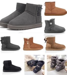 Botas de mujer para niñas, botas cortas Mini clásicas hasta la rodilla, botas altas para la nieve para invierno, botines para mujer, pajarita en el tobillo, zapatos deportivos negros y grises castaños