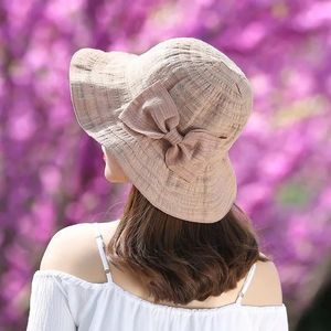 Femmes Bow Sun Hat avec un large bord pliable amovible amovible d'été SUMPREEN ANTI UV PROTECTION FISHERMAN CHAME Lady Breathable Panama Hat 240415