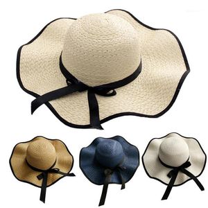 Femmes Bowknot Paille Weave Wavy Large Brim Sunscreen Outdoor Beach Sunhat Cap Chapeau Anti Uv Cap Girls Sun Hat Panama1