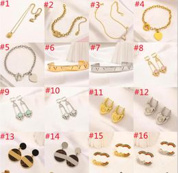 Vrouwen Brief Letter Bracelet oorbellen ketting sieraden sets high -end ontwerper kristallen roestvrijstalen gilden zilveren platen hanger oorrang bruiloft jeweler