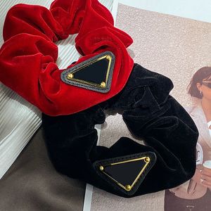 Vrouwen merk fluweel boog scrunchies designer sieraden brief haar rubberen band elastische haardoor paardenstaarthouder luxe haaraccessoires