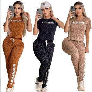 Mujeres que viajan con pantalones de dos piezas Camiseta de la tripulación de la tripulación negra y pantalones de diseñador Jogging Juego de jogging diario de jogging barco gratis