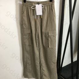 Pantalones cargo a cuadros frescos para mujer, pantalones de pierna ancha con cintura elástica, pantalones de chándal de diseñador a la moda, pantalones con cremallera