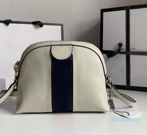 Bolsas de cuerpo cruzado Femenino Bolsa de concha lienzo superior y material de cuero Letras doradas Diseño de hardware Estilo de la noche Diseñadora Bag 8864