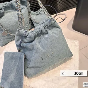 Vrouwenontwerper 22 Garbage Tas Silver Rivets Decoratie Denim 17/30/35cm Hollow munt Charm letters Hardware geweven ketting schouder schouder Cross Body Handtas ritssluiting