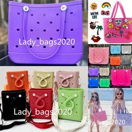 Diseñador de mujeres Bag Bags Beach Bolss Luxury Summer Hole Tote Garn Shoping Fashion Basket Bankable Silicona Silicona Accesorios Bog Hebilla Nuevo