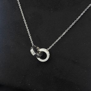 Collier d'amour de créateur de femmes Collier Double anneau de diamant colle de luxe pendentif