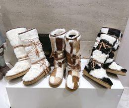 Bottes de neige de créateurs pour femmes, mode automne et hiver, couleurs mélangées, bottes de neige intégrées en fourrure, chaussures en laine à semelles épaisses et bottes de princesse au mollet