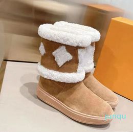 Botas de tobillo planas Snowdrop de diseñador para mujer, botines de invierno Martin de cuero liso con forro de lana, suela de goma informal, estilo callejero de gamuza