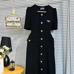 Vrouwen aankleden designer jurken mode metalen hanger zwarte bustier casual slanke knop korte mouw