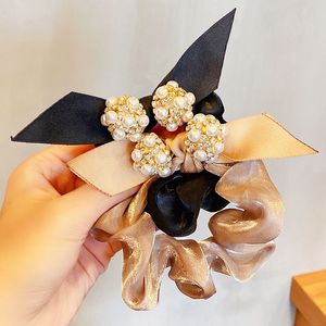 Femmes élégant luxe perle strass fleur élastique bandes de cheveux doux queue de cheval décorer Scrunchie cheveux cravate mode cheveux accessoires