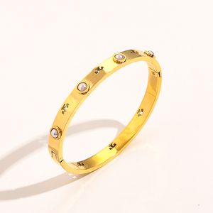 Diseñador de moda para mujer Brazalete con letras Pulsera de acero inoxidable chapada en oro de 18 quilates Accesorios para brazaletes Regalos ZG1377