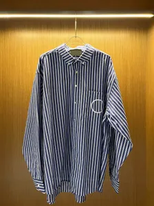 Camisa de moda femenina solapa vintage rayas blusa de gran tamaño manga botón de manga larga