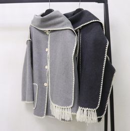 Abrigo de lana a la moda para mujer, retazos con borlas y bufanda, abrigos de manga larga con bolsillo, chaqueta cruzada, prendas de vestir exteriores de Cachemira para invierno