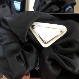 Vrouwen meisje driehoek elastische haarband schattige brieven haar stropdassen voor cadeau feest mode haaraccessoires groothandelsprijs