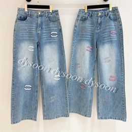 Damesjeans geborduurd roze of wit patroon denimbroek blauw met stofzak 25942