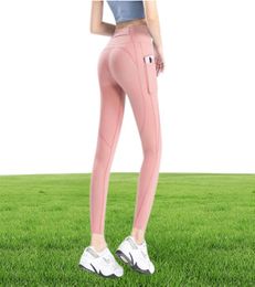 Femmes Leggings Pantalons de yoga gymnase Jogger Spandex Fitness Sports Leggins Running Buffed Nake Side Pocket Peach Hip Terre Capris Gym Pant Set1387292