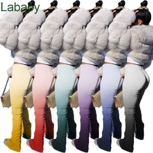 Femmes pantalons longs créateur de vêtements changeant de tempérament hanche-levage Slim Fit Mini Leggings Club Sexy Micro pantalon évasé