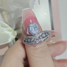 Mujeres Diseñador de lujo Anillo Gota de agua Corona Blanco Gran Moissanite Diamante Princesa Anillos Joyería PT950 Novia plateada Regalos Compromiso Anillo de bodas 1892