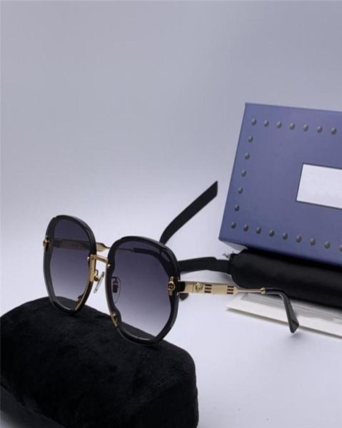 Femmes lunettes de soleil de créateur de luxe loisirs qualité les plus populaires hommes Vintage mode marque Design lunettes de soleil 04277687653