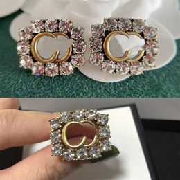 Mujeres Lujos Anillos de diseñador Pendientes de diamantes Compromisos de encanto para mujeres Anillo de amor Diseñadores Joyería Buzatue Mens Gold Ring264Y