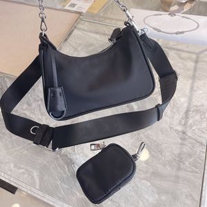 Femmes Luxurys Designers Sacs 2021 Épaule Femme De Trois-en-un Durée de la longueur Femme Messenger à la chaîne de la chaîne de la chaîne 22cm