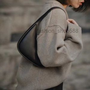 Bolsos de diseñador de lujo para mujer Bolso de hombro de cuero de fila de gama alta axila de mujer moda irregular portátil media luna simple mano Crossbody