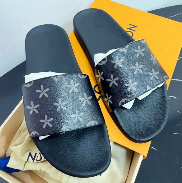 Mujer Hombre Frente al mar Mula Sandalia Zapatos de diseñador Diapositiva de lujo Tazz Zapatilla Zapato al aire libre Suela de goma Deslizadores Playa de verano Piscina negra Tacón plano Chanclas Flor Sandalia