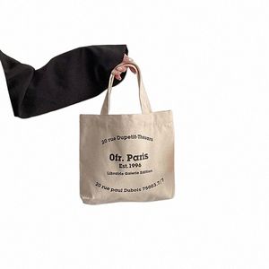 Mini bolso de mano para mujer, bolso de tienda de lona con estampado de letras de estilo coreano para Boutique, bolsa de almuerzo con letras femeninas, bolsa de mano X02m #