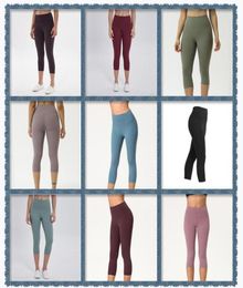 Traje de mujer Yoga Capri sin costuras Leggings para mujer Traje Pantalones recortados Cintura alta Deportes roscados Levantamiento de caderas Ropa de gimnasio Elástico Fi6495219