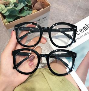 Vrouwen gewone bril frame mannen anti blauw lichte bril oversized vintage ronde ronde lens zwarte optische spektakel bril e067 f7479704