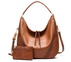 Bolso de mujer 2023 Nuevo Color sólido Comercio exterior Borla Bolso madre Gran capacidad Bolso de mano de un hombro Bolso de compras de moda europea y americana